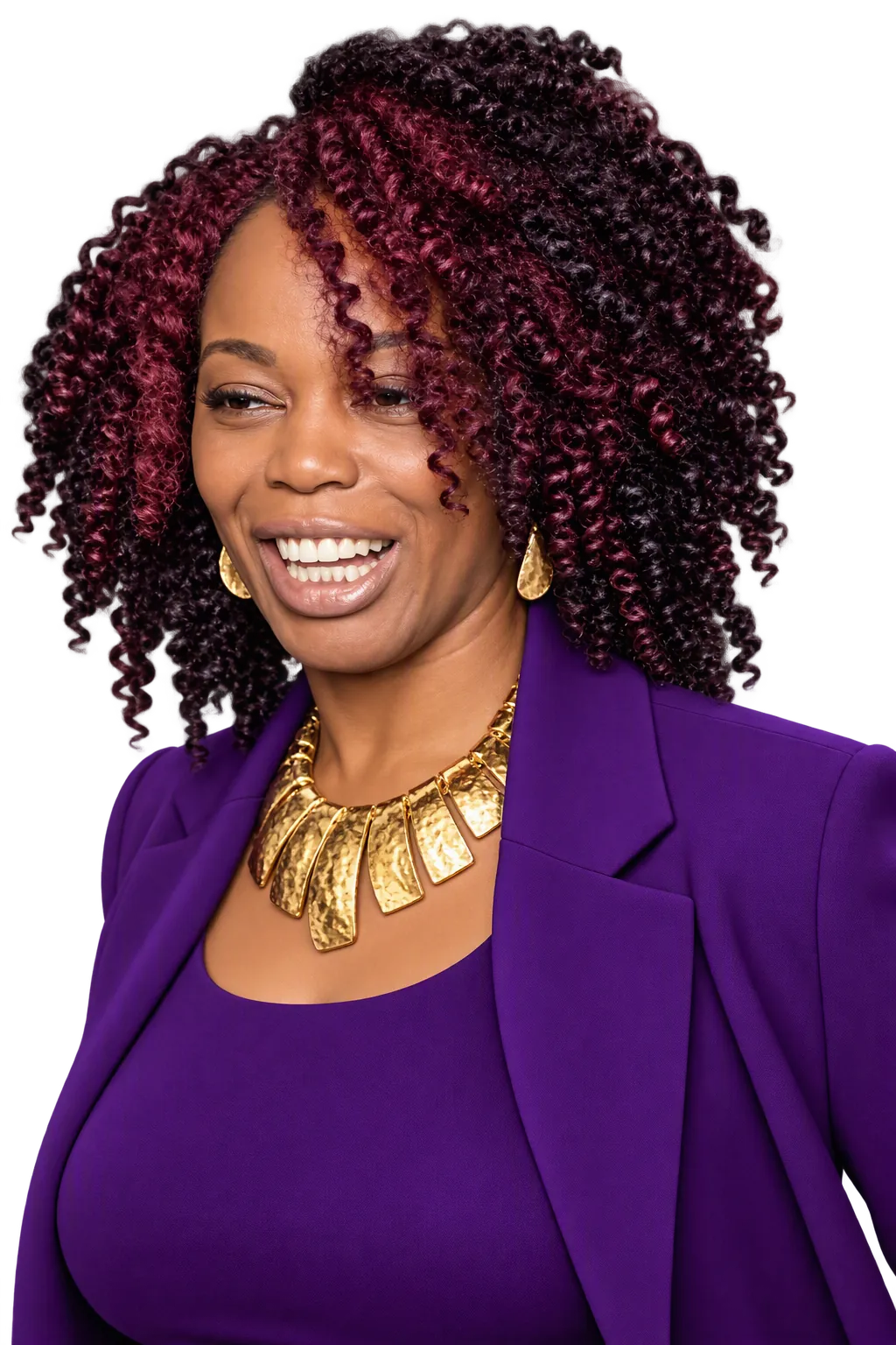 Freedom Queen smiling in a purple blazer with a gold necklace